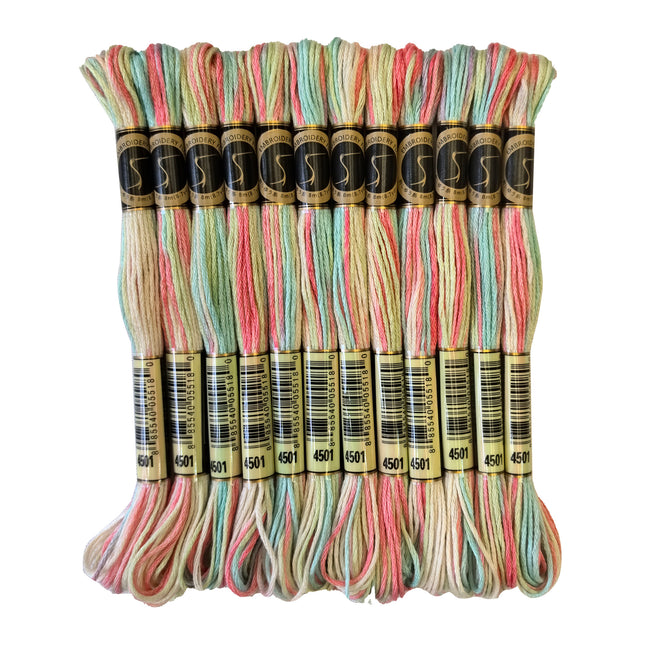 Pack of embroidery threads with colorful skeins on a white background