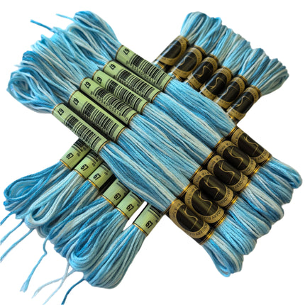 Bundles of light blue embroidery floss with labels on a white background