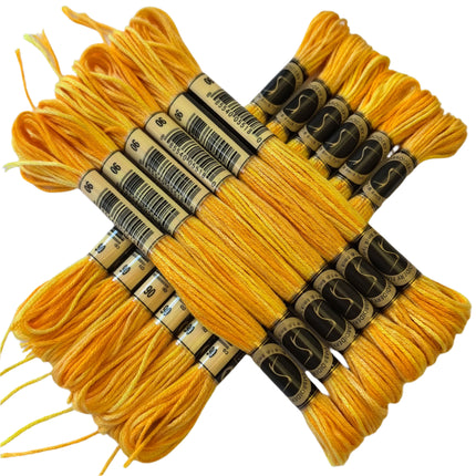 Yellow embroidery floss skeins with labels on a white background
